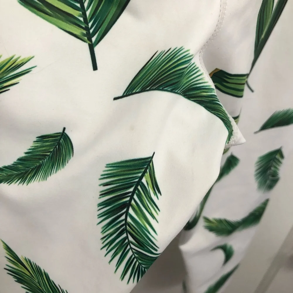 SLINKII 🌿 white tropics leggings size small